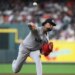 Yankees starting pitcher Luis Gil (81) delivers a pitch during the second inning against the Houston Astros at Daikin Park.