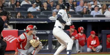 Ryan McMahon, hitting an infield single in the third inning, later tried to bunt for a hit in the sixth inning but grounded out to the pitcher in the Yankees' 7-1 loss to the Angels on April 14, 2026 at the Stadium.