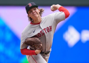 Boston Red Sox pitcher Connelly Early delivering a pitch.