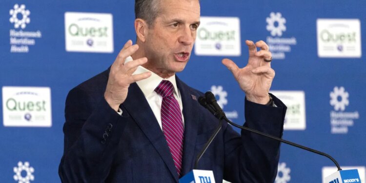 New New York Giants head coach John Harbaugh speaking at his introductory press conference.