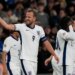 England's Harry Kane celebrating his team's second goal with teammates during a UEFA Nations League soccer match.