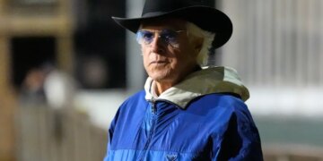 Trainer Bob Baffert in a cowboy hat and sunglasses.