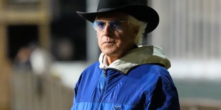 Trainer Bob Baffert in a cowboy hat and sunglasses.