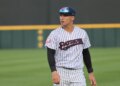 Somerset Patriots player Anthony Volpe #7 warming up on the field.