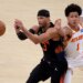 Atlanta Hawks forward Jalen Johnson (1) defends an in-bounds pass to New York Knicks guard Josh Hart (3) during the first quarter of game five of the first round of the 2026 NBA Playoffs at Madison Square Garden.