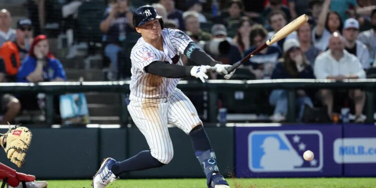 Anthony Volpe of the Somerset Patriots hitting an infield single.