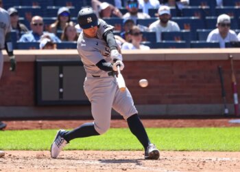 New York Yankees shortstop Anthony Volpe hitting a 2-run RBI single.
