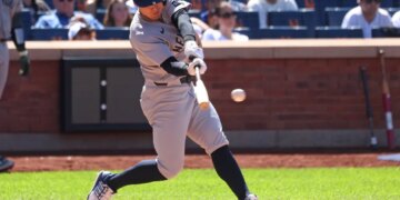 New York Yankees shortstop Anthony Volpe hitting a 2-run RBI single.