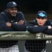 Anthony Volpe (r.) watches from the Yankees dugout during a game against the Orioles on May 12, 2026.