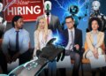 illustration four people sitting holding paper wit a red and white now hiring sign behind them and robots all around them