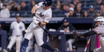 New York Yankees first baseman Ben Rice (22) hits a single in the eighth inning against the Baltimore Orioles at Yankee Stadium, Friday, May 1, 2026, in Bronx, NY.
