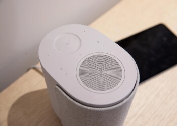The top of the Bose Ultra Speaker showing its capacitive controls and upward-firing speaker.