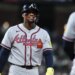 Atlanta Braves outfielder Ronald Acuna Jr. smiling in his uniform.