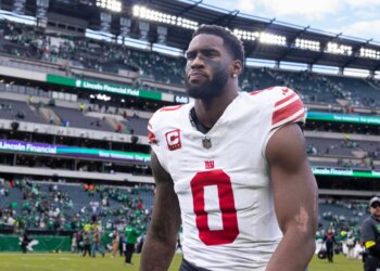 New York Giants player Brian Burns walks off the field after a loss to the Philadelphia Eagles at Lincoln Financial Field.