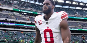 New York Giants player Brian Burns walks off the field after a loss to the Philadelphia Eagles at Lincoln Financial Field.