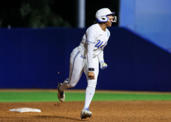 Freshman Jolyna Lamar celebrates as she rounds the bases after belting the game-tying two-run homer in the seventh inning of UCLA's 12-11 win over Cal Baptist in their NCAA Tournament opener on May 15, 2026 in Los Angeles.