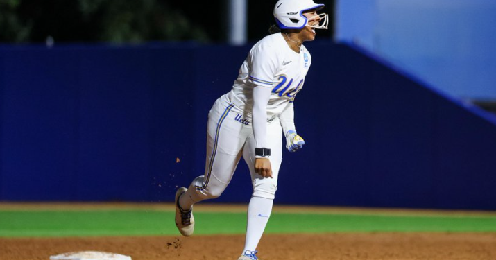 Freshman Jolyna Lamar celebrates as she rounds the bases after belting the game-tying two-run homer in the seventh inning of UCLA's 12-11 win over Cal Baptist in their NCAA Tournament opener on May 15, 2026 in Los Angeles.