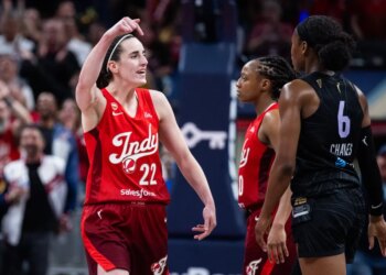 Indiana Fever guard Caitlin Clark (22) celebrates a made shot.