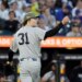 New York Yankees pitcher Cam Schlittler (31) reacting after ending the second inning during a baseball game.