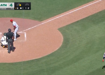 Overhead shot of a baseball game in progress with the Athletics leading the Cardinals 4 to 3 in the 9th inning.