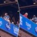 Cardinals fan dangerously hangs off upper deck ledge in terrifying scene