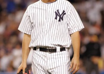 Yankees starting pitcher Carl Pavano walks off the mound after he was taken out of the game in the 6th inning.