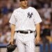 Yankees starting pitcher Carl Pavano walks off the mound after he was taken out of the game in the 6th inning.