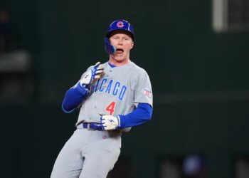 Chicago Cubs' Pete Crow-Armstrong reacting after hitting a double.