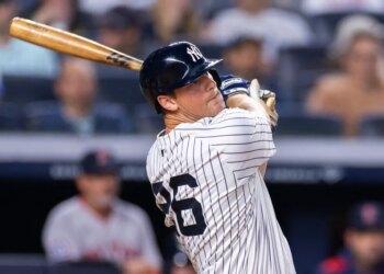 DJ LeMahieu #26 of the New York Yankees hits a solo homer during the fifth inning against the Boston Red Sox at Yankee Stadium, Sunday, June 8, 2025, in Bronx, NY. (