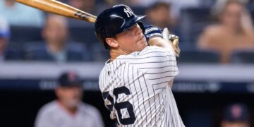 DJ LeMahieu #26 of the New York Yankees hits a solo homer during the fifth inning against the Boston Red Sox at Yankee Stadium, Sunday, June 8, 2025, in Bronx, NY. (