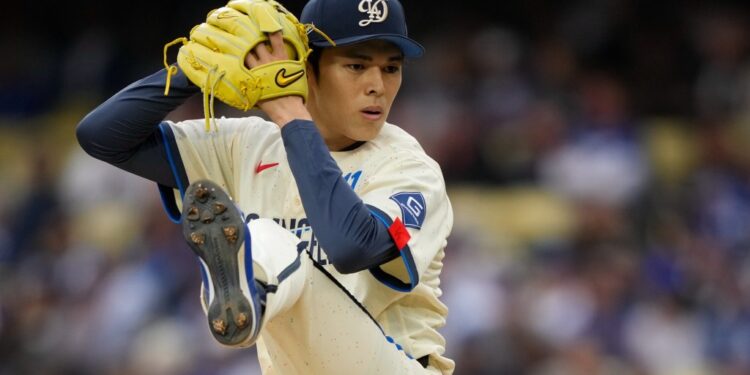 Roki Sasaki pitching.