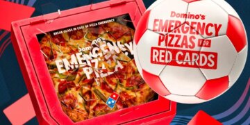 Illustration of a red box with "BREAK GLASS IN CASE OF PIZZA EMERGENCY" containing a pepperoni and pepper pizza, next to a soccer ball that says "Domino's EMERGENCY PIZZAS FOR RED CARDS."