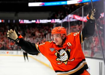 Anaheim Ducks center Leo Carlsson celebrates his empty net goal.