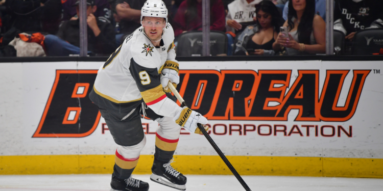 May 8, 2026; Anaheim, California, USA; Vegas Golden Knights center Jack Eichel (9) moves the puck against the Anaheim Ducks during the second period in game three of the second round of the 2026 Stanley Cup Playoffs at Honda Center. Mandatory Credit: Gary A. Vasquez-Imagn Images