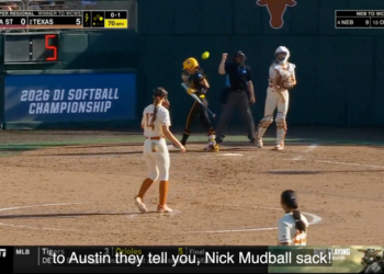 A softball game between Arizona State and Texas, with Texas leading 5-0 in the 7th inning.