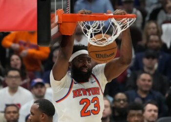 Mitchell Robinson dunks during Game 4 of the Eastern Conference finals.