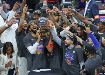Karl-Anthony Towns and the Knicks celebrate with the Bob Cousy trophy after winning the Eastern Conference finals on May 25, 2026.