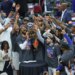 Karl-Anthony Towns and the Knicks celebrate with the Bob Cousy trophy after winning the Eastern Conference finals on May 25, 2026.