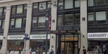 Exterior view of Seven Penn Plaza in New York City with Sweetgreen and Oakberry storefronts.