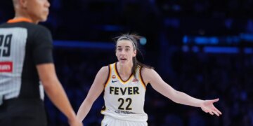 Indiana Fever guard Caitlin Clark (22) reacts to a call during the first half of a WNBA basketball game against the Los Angeles Sparks Wednesday, May 13, 2026, in Los Angeles.
