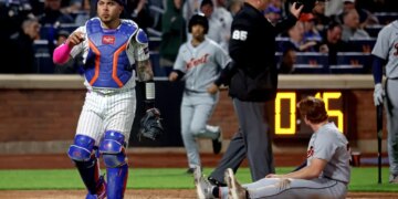 New York Mets catcher Francisco Alvarez (4) tags out Detroit Tigers third baseman Colt Keith (33) on a play at the plate ending the fifth inning.