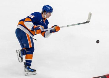 New York Islanders defenseman Matthew Schaefer (48) shoots during the third period against the Carolina Hurricanes at UBS Arena, Tuesday, April 14, 2026