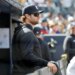 New York Yankees player Gerrit Cole in the dugout during a baseball game.