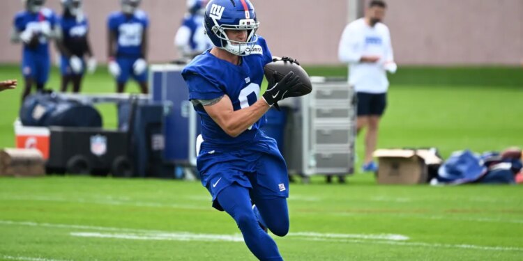 Giants wide receiver Gunner Olszewski (0) catches a pass at practice.