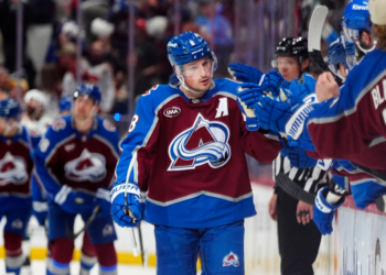 May 3, 2026; Denver, Colorado, USA; Colorado Avalanche defenseman Cale Makar (8) celebrates his goal scored against the Minnesota Wild during the third period in game one of the second round of the 2026 Stanley Cup Playoffs at Ball Arena. Mandatory Credit: Ron Chenoy-Imagn Images