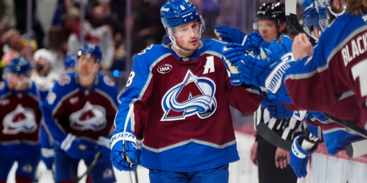 May 3, 2026; Denver, Colorado, USA; Colorado Avalanche defenseman Cale Makar (8) celebrates his goal scored against the Minnesota Wild during the third period in game one of the second round of the 2026 Stanley Cup Playoffs at Ball Arena. Mandatory Credit: Ron Chenoy-Imagn Images
