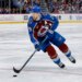 Colorado Avalanche center Nathan MacKinnon (29) controls the puck in overtime against the Minnesota Wild.