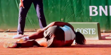 Hailey Baptiste is seen injured on the court