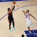 New York Knicks guard Jalen Brunson (11) shoots over Philadelphia 76ers forward Dominick Barlow (25).