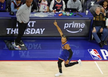 New York Knicks guard Jalen Brunson (11) reacting after scoring against the Philadelphia 76ers.